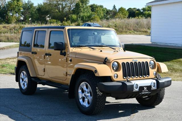 used 2014 Jeep Wrangler Unlimited car, priced at $17,288