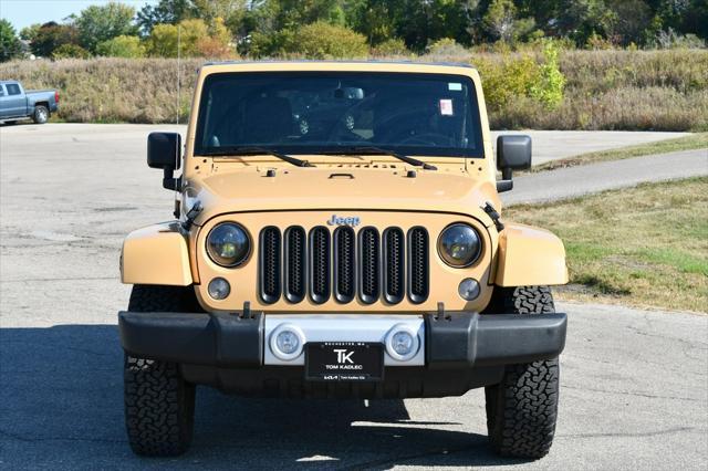 used 2014 Jeep Wrangler Unlimited car, priced at $17,288