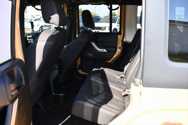 used 2014 Jeep Wrangler Unlimited car, priced at $17,288