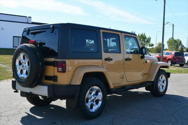 used 2014 Jeep Wrangler Unlimited car, priced at $17,288