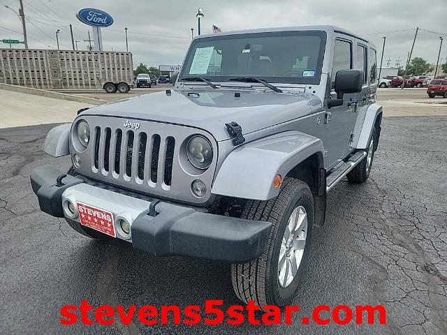 used 2015 Jeep Wrangler Unlimited car, priced at $19,272