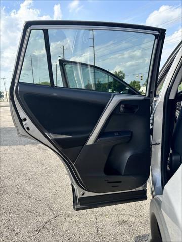 used 2018 Toyota RAV4 car, priced at $13,999