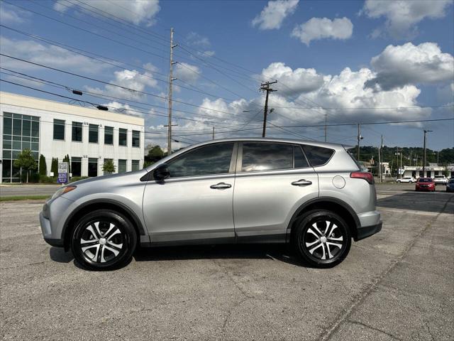 used 2018 Toyota RAV4 car, priced at $13,999