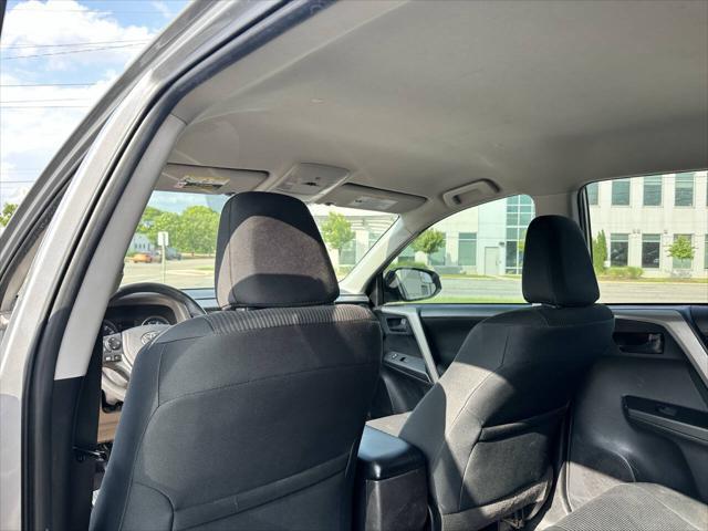 used 2018 Toyota RAV4 car, priced at $13,999