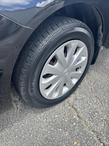 used 2015 Nissan Versa car, priced at $4,999