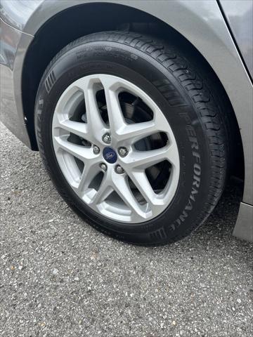 used 2014 Ford Fusion car, priced at $4,999