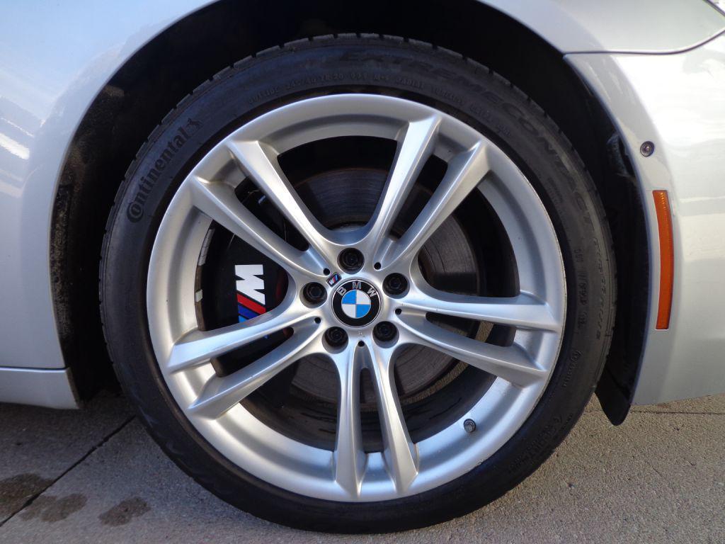 used 2014 BMW 750 car, priced at $10,995