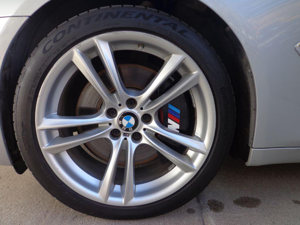 used 2014 BMW 750 car, priced at $10,995