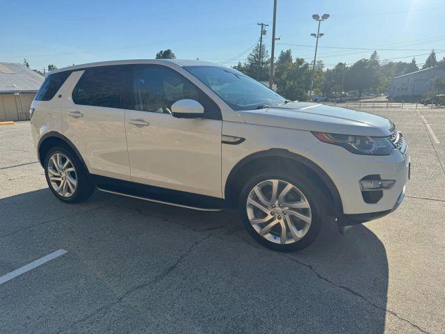used 2015 Land Rover Discovery Sport car, priced at $11,999