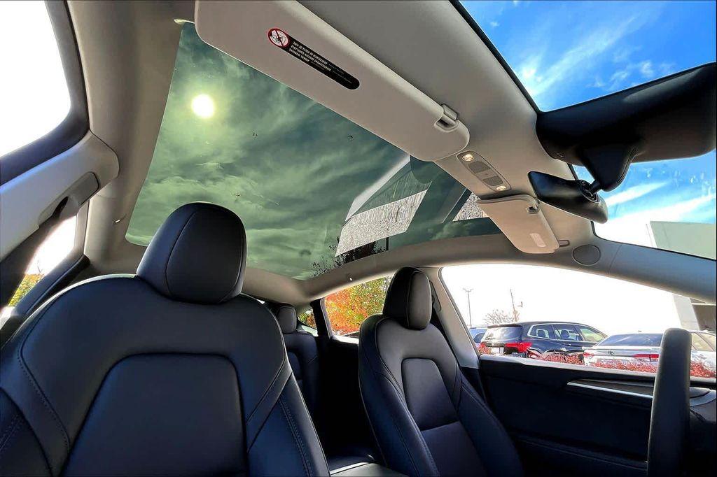 used 2025 Tesla Model Y car, priced at $37,951