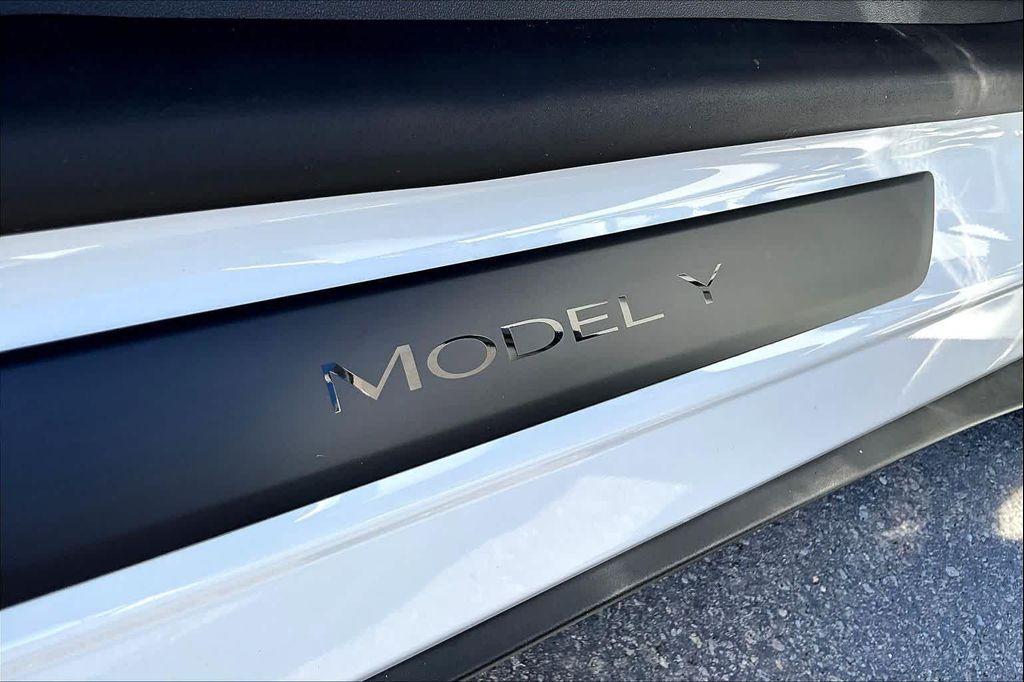 used 2025 Tesla Model Y car, priced at $37,951