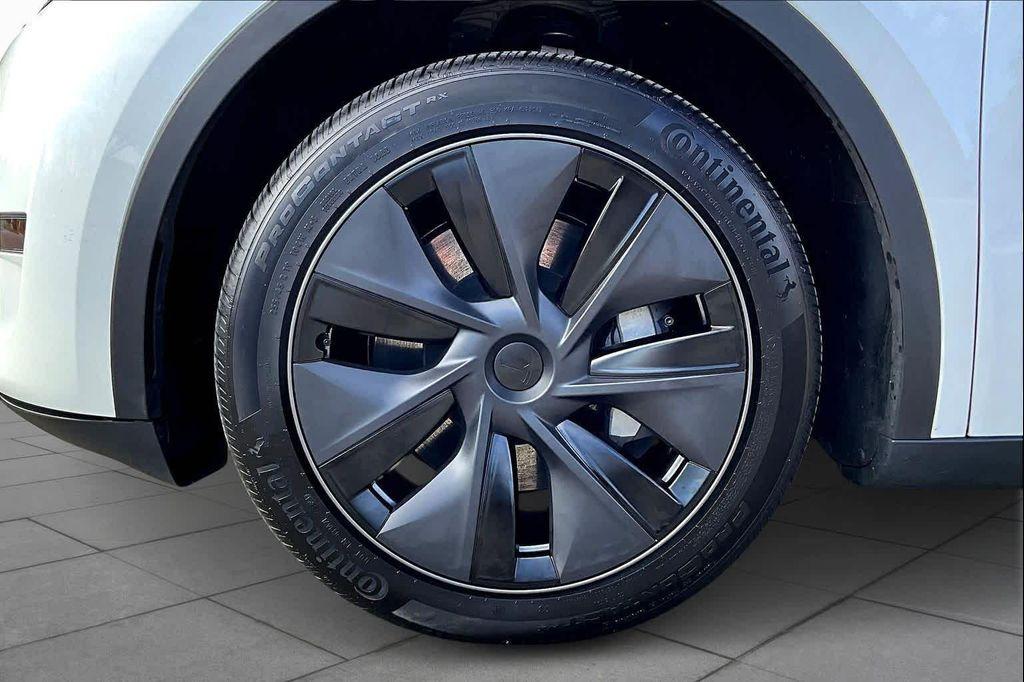 used 2025 Tesla Model Y car, priced at $37,951