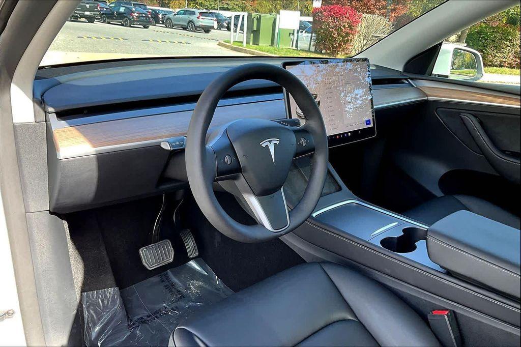 used 2025 Tesla Model Y car, priced at $37,951