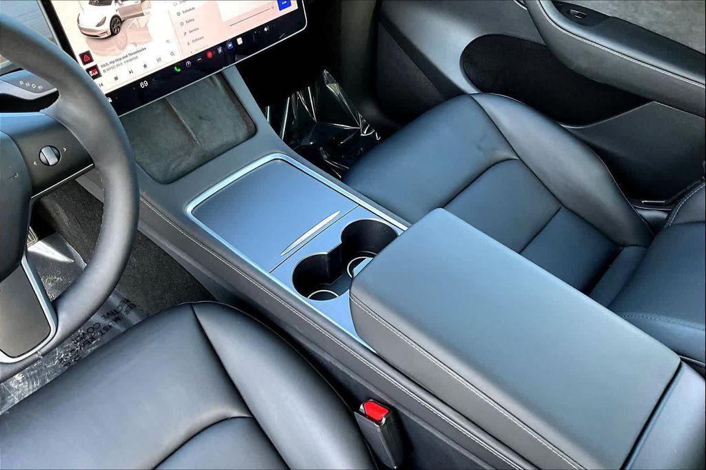 used 2025 Tesla Model Y car, priced at $37,951