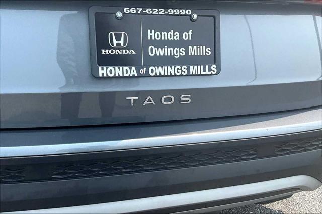 used 2023 Volkswagen Taos car, priced at $19,699