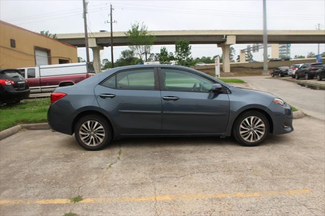 used 2018 Toyota Corolla car, priced at $12,000