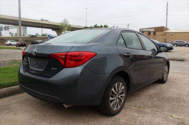 used 2018 Toyota Corolla car, priced at $12,000