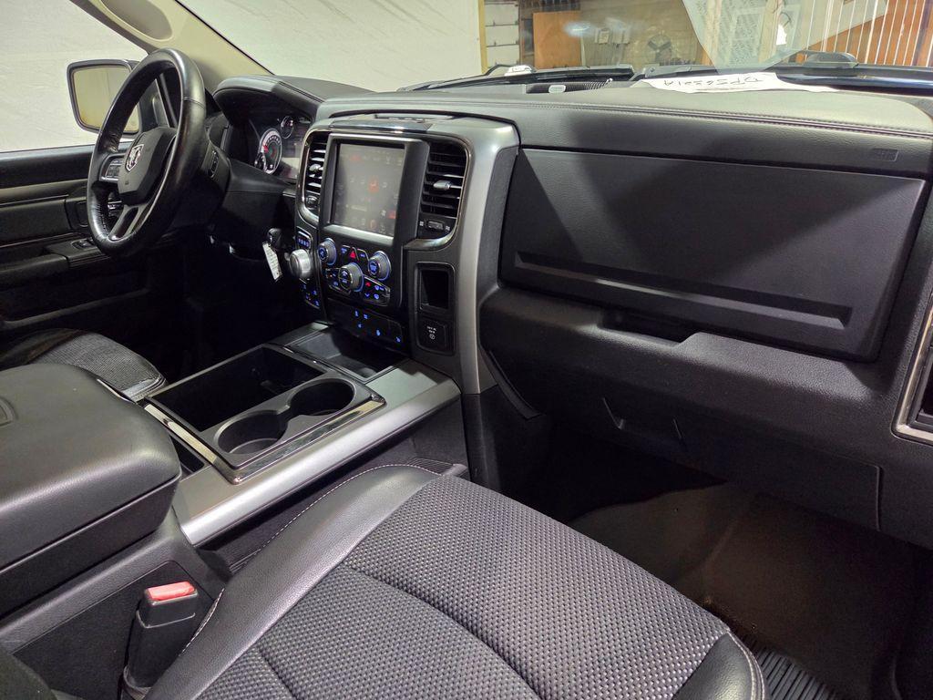 used 2015 Ram 1500 car, priced at $14,999