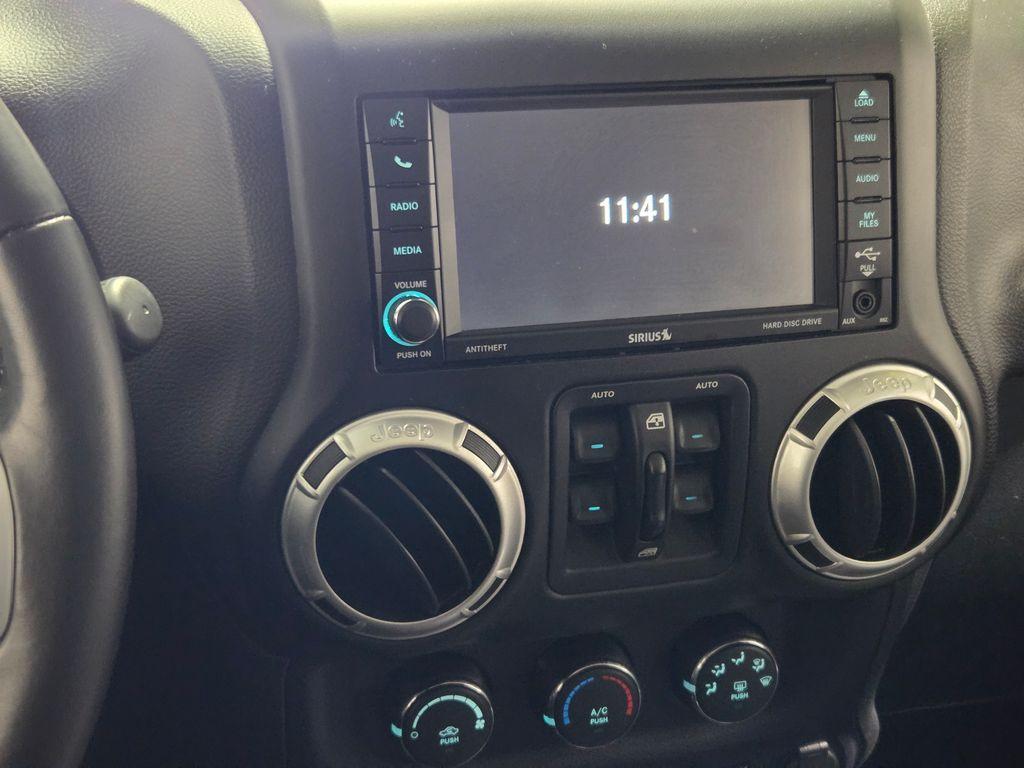 used 2015 Jeep Wrangler Unlimited car, priced at $17,743