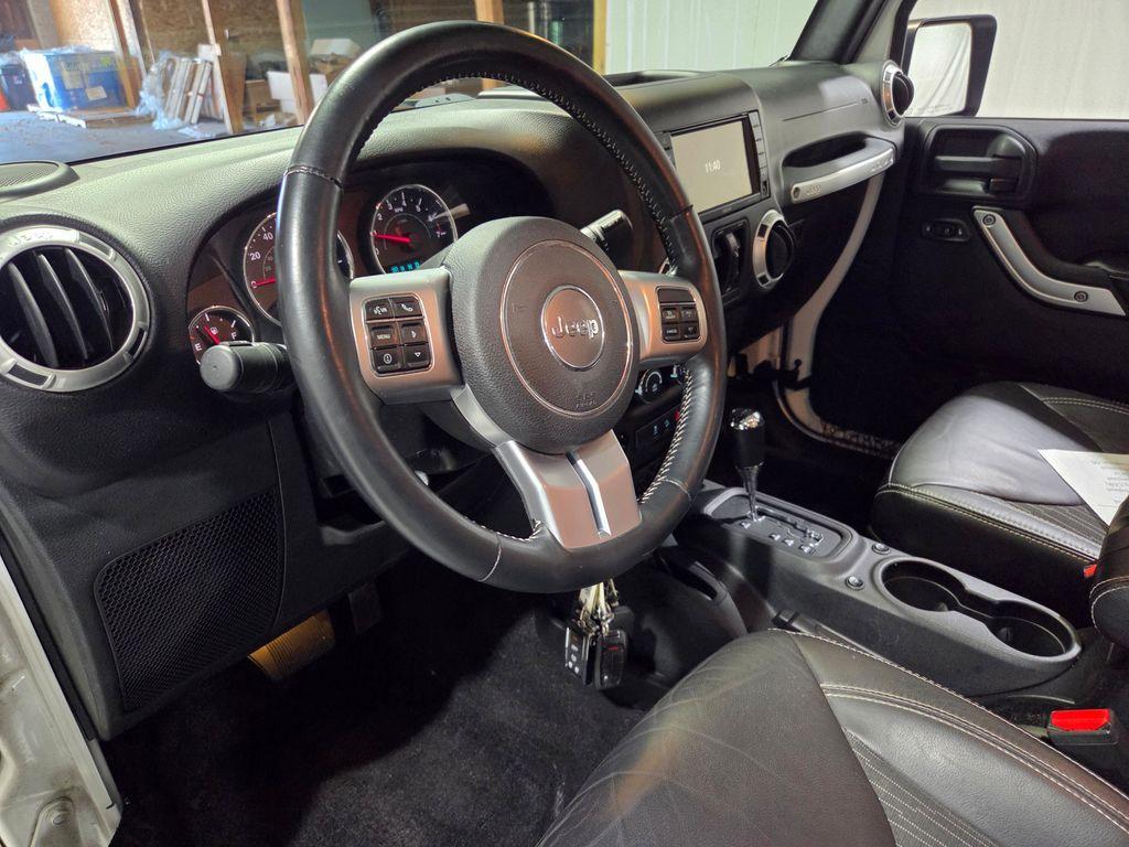 used 2015 Jeep Wrangler Unlimited car, priced at $17,743