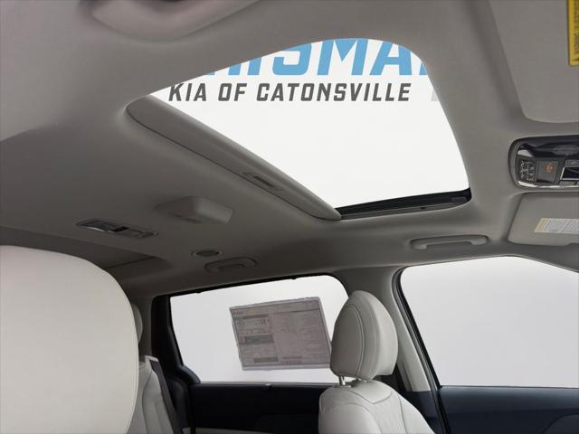 new 2025 Kia Carnival Hybrid car, priced at $47,688