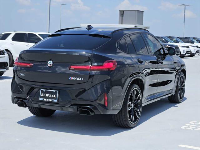 used 2023 BMW X4 car, priced at $56,990
