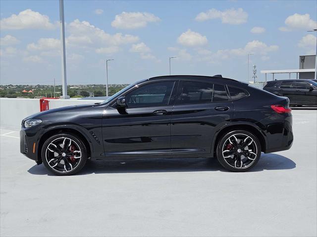 used 2023 BMW X4 car, priced at $56,990