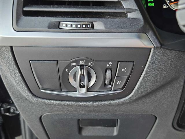 used 2023 BMW X4 car, priced at $56,990