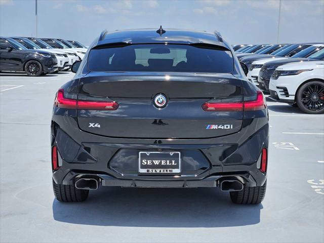 used 2023 BMW X4 car, priced at $56,990