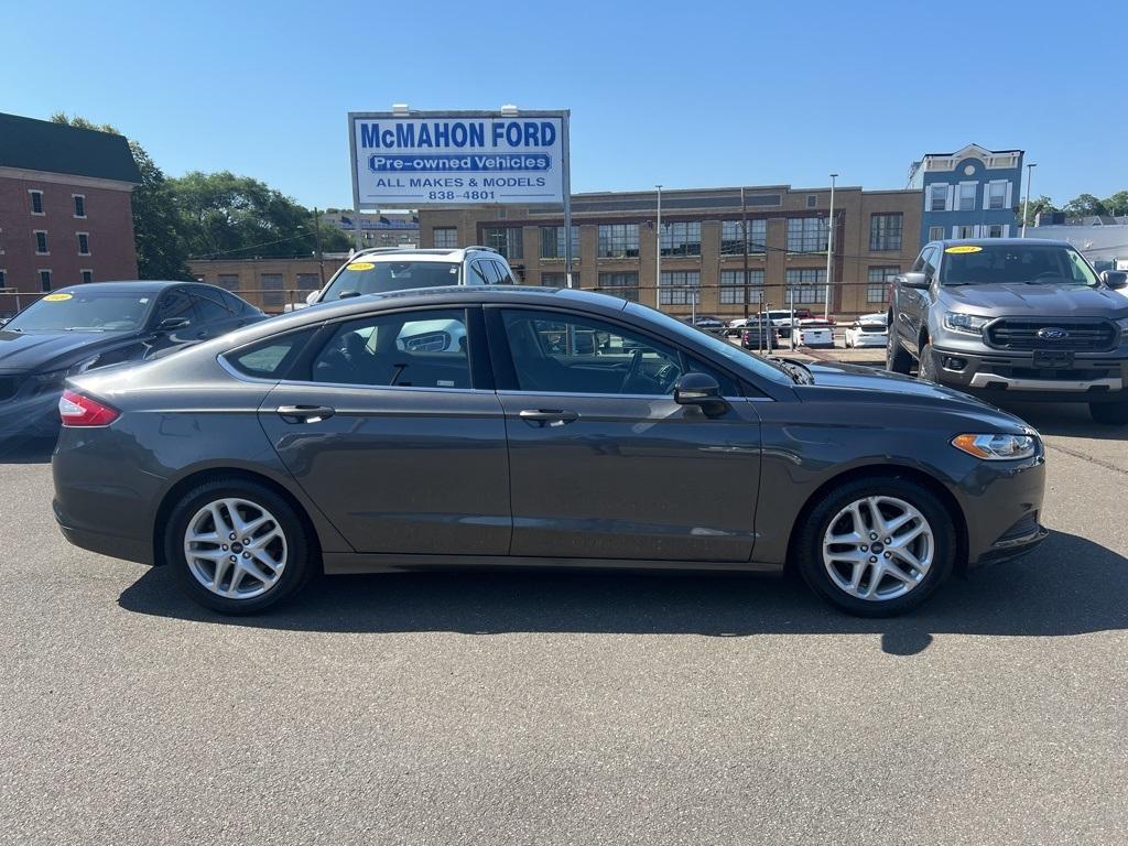 used 2016 Ford Fusion car, priced at $15,000