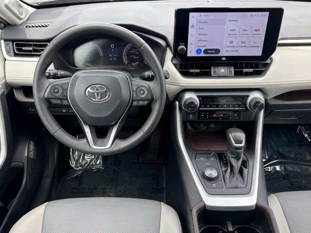 used 2023 Toyota RAV4 Hybrid car, priced at $27,879