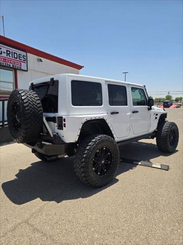 used 2013 Jeep Wrangler Unlimited car, priced at $26,991
