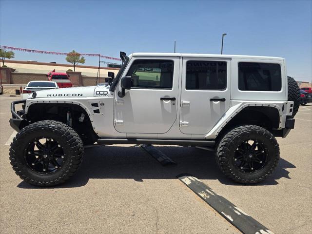 used 2013 Jeep Wrangler Unlimited car, priced at $26,991