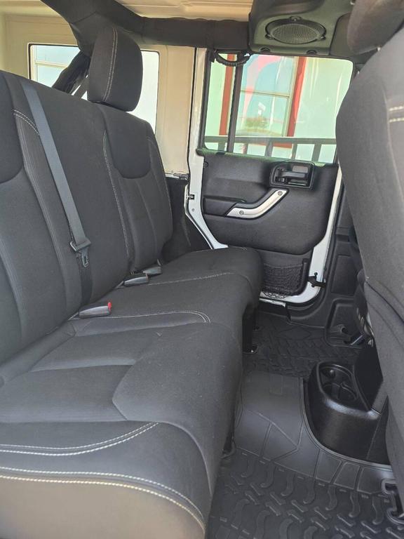 used 2013 Jeep Wrangler Unlimited car, priced at $26,991