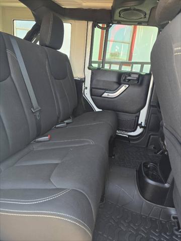 used 2013 Jeep Wrangler Unlimited car, priced at $26,991