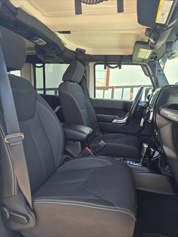 used 2013 Jeep Wrangler Unlimited car, priced at $26,991