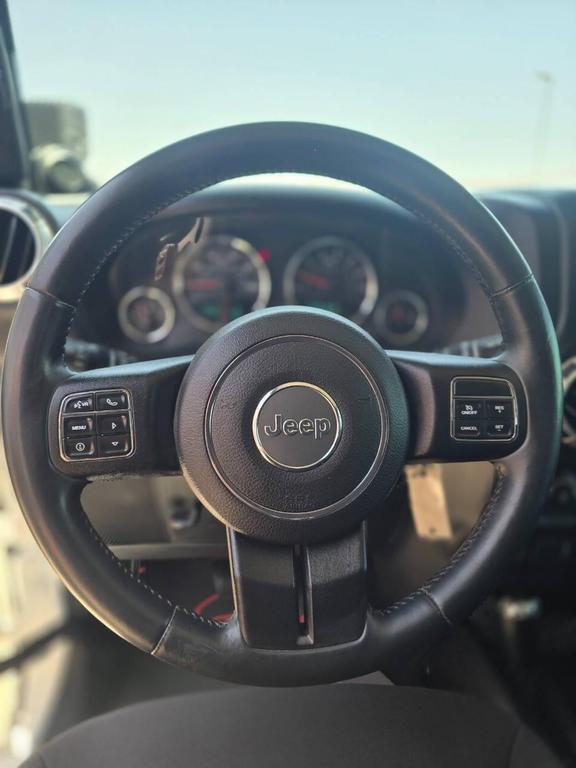 used 2013 Jeep Wrangler Unlimited car, priced at $26,991