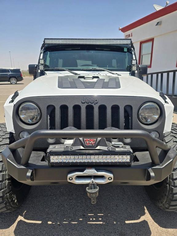 used 2013 Jeep Wrangler Unlimited car, priced at $26,991