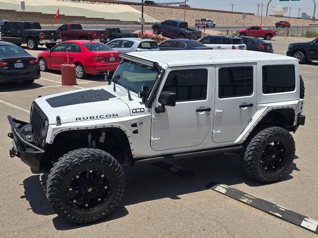 used 2013 Jeep Wrangler Unlimited car, priced at $26,991