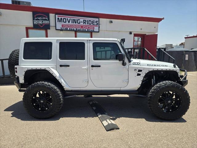 used 2013 Jeep Wrangler Unlimited car, priced at $26,991