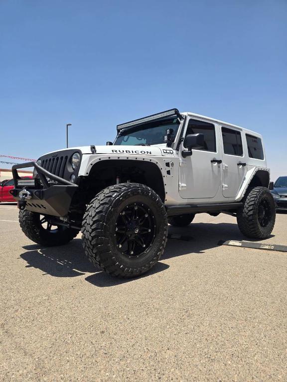 used 2013 Jeep Wrangler Unlimited car, priced at $26,991
