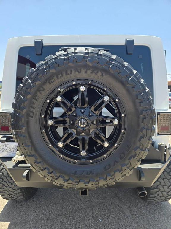 used 2013 Jeep Wrangler Unlimited car, priced at $26,991