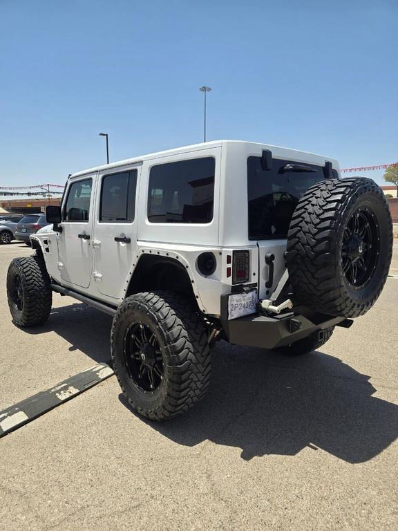 used 2013 Jeep Wrangler Unlimited car, priced at $26,991