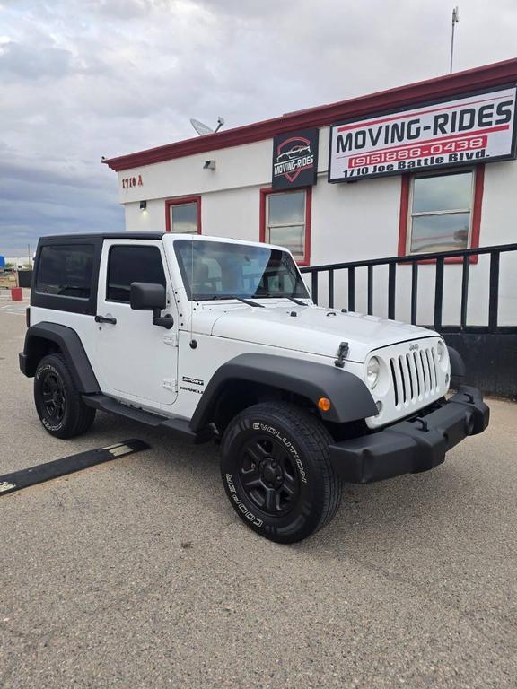 used 2014 Jeep Wrangler car, priced at $13,991