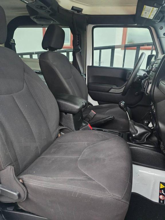 used 2014 Jeep Wrangler car, priced at $13,991