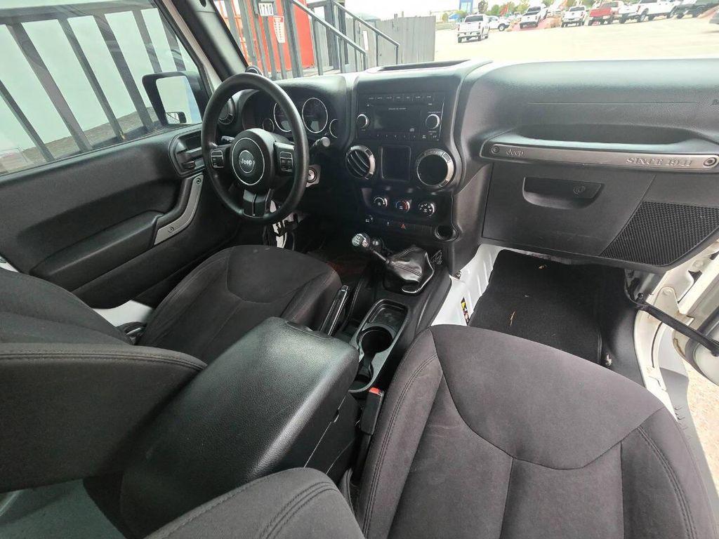 used 2014 Jeep Wrangler car, priced at $13,991