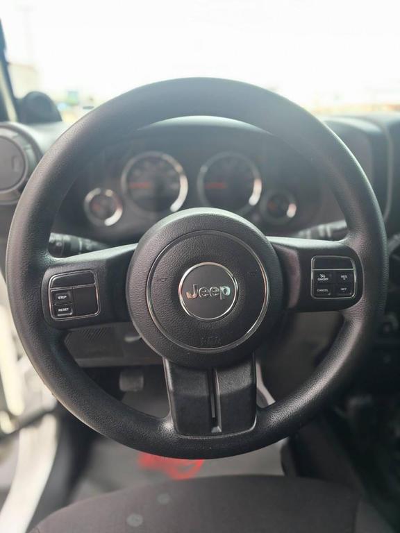used 2014 Jeep Wrangler car, priced at $13,991