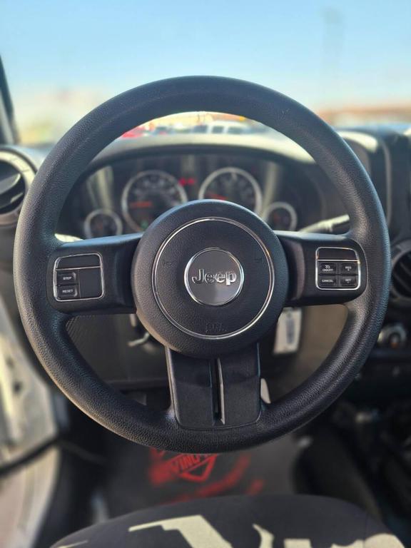 used 2015 Jeep Wrangler car, priced at $19,991