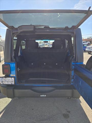 used 2015 Jeep Wrangler Unlimited car, priced at $19,999