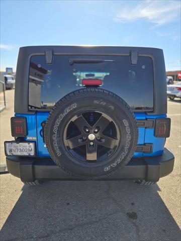 used 2015 Jeep Wrangler Unlimited car, priced at $19,999